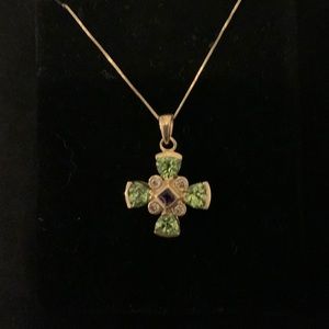 Gold cross with semi precious stones on delicate 18” chain